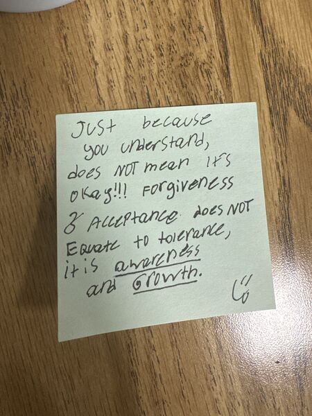 Handwritten sticky note with words of encouragement